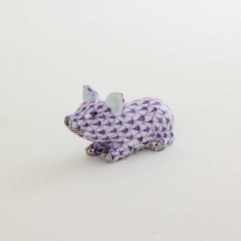 05354-0-00 VHL-PTLittle Pig Lying - Fishnet Purple Small pig figurine with hand painted purple fishnet decor. Available with world wide shipping and gift box packaging